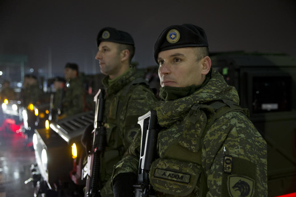 Soldiers of Kosovo Security Force line up at the end of the army formation ceremony in capital Pristina, Kosovo on Friday, Dec. 14, 2018. Kosovo's parliament convened on Friday to approve the formation of an army, a move that has angered Serbia which says it would threaten peace in the war-scarred region. (AP Photo/Visar Kryeziu)
