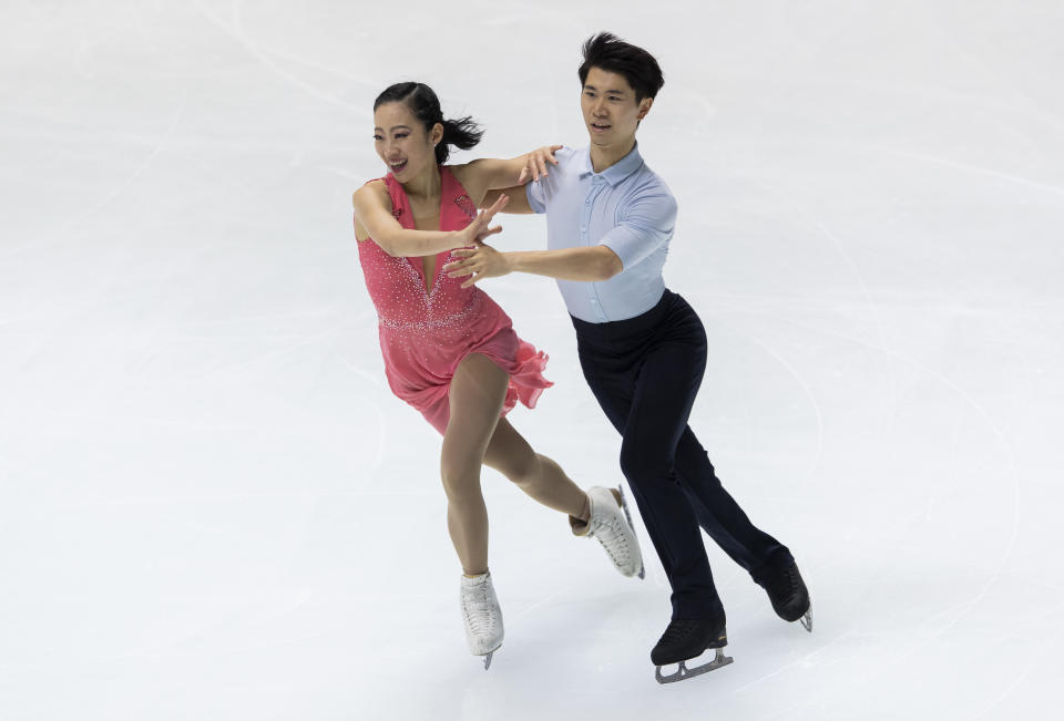 Rikako Fukase, left, and Eichu Cho of Japan perform during a rhythm dance of an ISU Grand Prix of Figure Skating competition in Kadoma near Osaka, Japan, Friday, Nov. 27, 2020. (AP Photo/Hiro Komae)