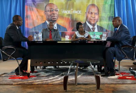 Presidential candidates Faustin-Archange Touadera (right) and Anicet-Georges Dologuele (left) face each other during a live television debate ahead of Sunday's second round election, in Bangui, Central African Republic, February 12, 2016. REUTERS/Siegfried Modola