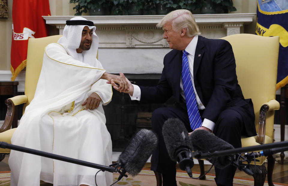 Crown Prince Mohammed bin Zayed al-Nahyan and President Donald Trump shake hands&nbsp;at the White House in May 2017. (Photo: Kevin Lamarque/Reuters)