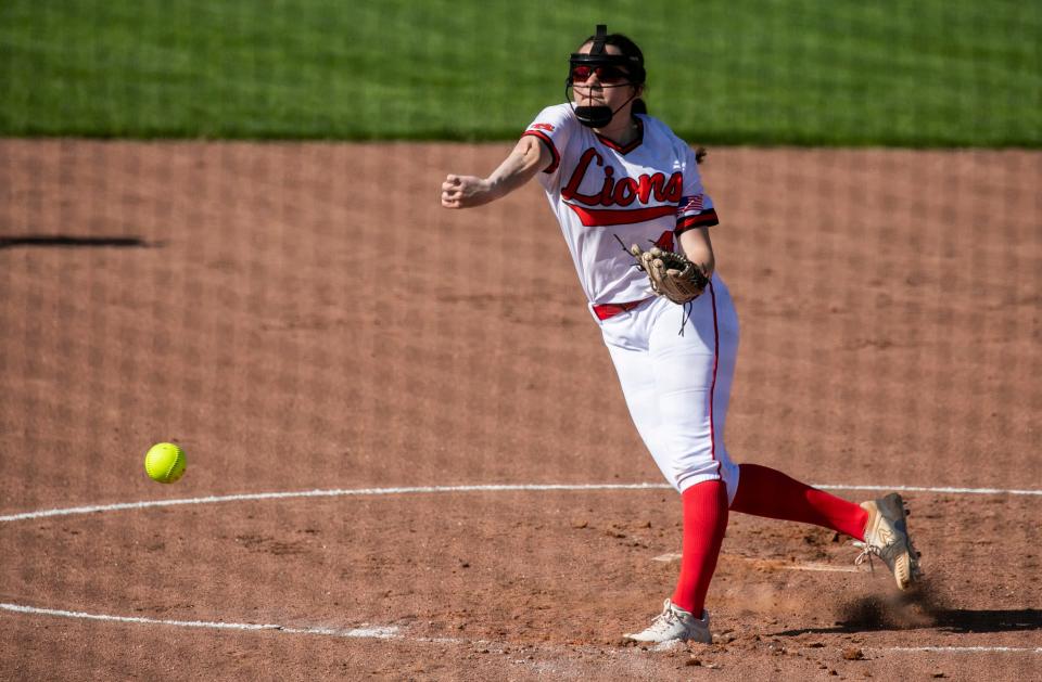 Liberty Union's Suzie Shultz (4) fires in a pitch against a Lakewood batter in varsity Division III softball action at Liberty Union High School on May 10, 2023, in Baltimore, Ohio. Baltimore defeated Lakewood 3-1.