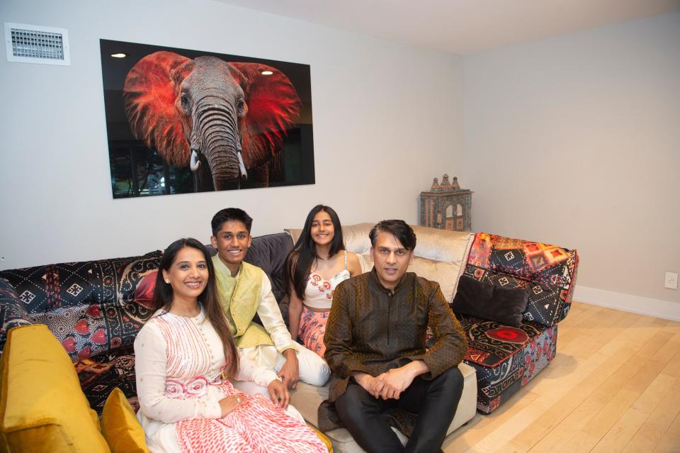 An increasing number of schools are giving the day off for religious holidays, including the Hindu holiday of Diwali.  From left, Pina Shah, Arnav Patel, Paresh Patel and Ashna Patel, believe that adding Diwali to the school calendar makes Hindu families feel recognized in their communities. 