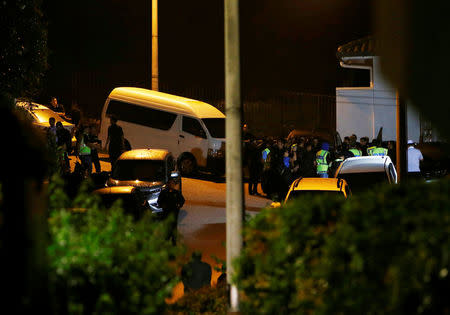 Police arrive at former prime minister Najib Razak's residence in Kuala Lumpur, Malaysia May 16, 2018. REUTERS/Lai Seng Sin