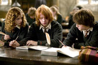 <p>Emma Watson as Hermione, Rupert Grint as Ron and Daniel Radcliffe as Harry in Warner Bros. Harry Potter and the Goblet of Fire - 2005</p>