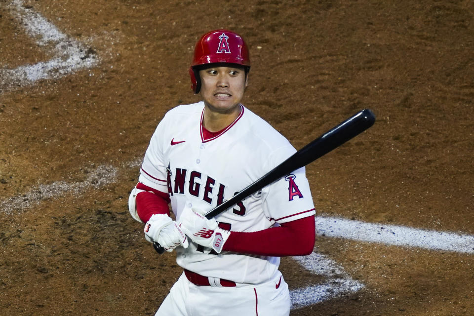 Los Angeles Angels' Shohei Ohtani reacts after a swinging strike during the third inning of the team's baseball game against the San Francisco Giants, Wednesday, Aug. 9, 2023, in Anaheim, Calif. (AP Photo/Ryan Sun)