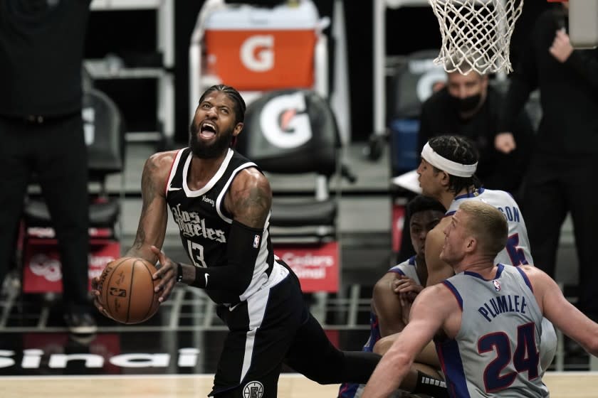 Clippers' Paul George looks to shoot during a game against the Detroit Pistons on April 11 at Staples Center.