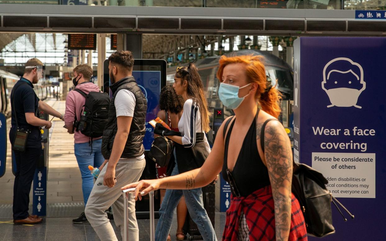 Face masks are proving divisive among Britons  -  Ian Hodgson/Â© 2020 Bloomberg Finance LP