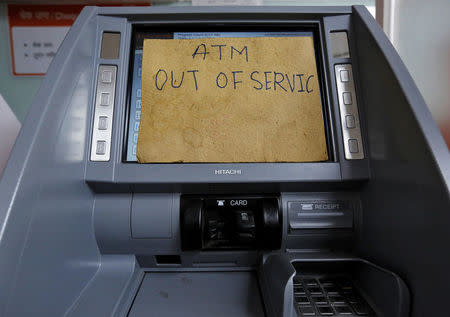 An improvised notice board is seen on automated teller machine (ATM) in Mumbai, India, November 9, 2016. REUTERS/Danish Siddiqui