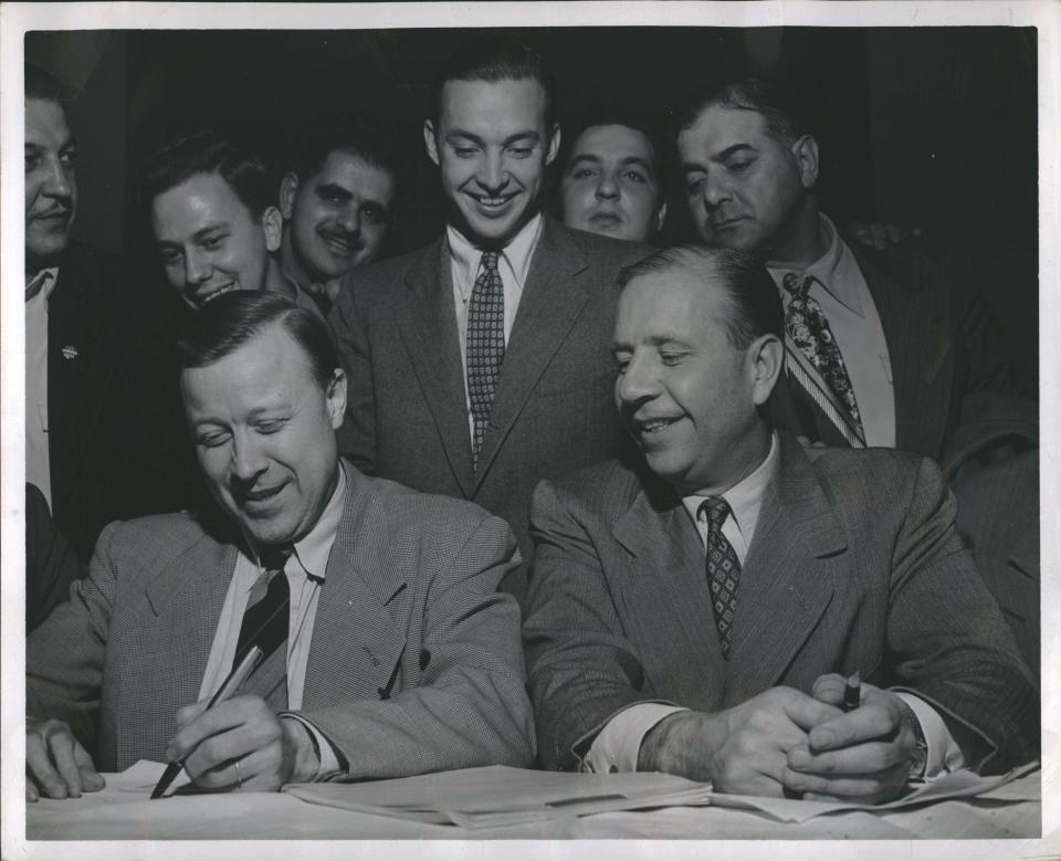 UAW President Walter Reuther, left, William Clay Ford and John Bugas, who had wrested control of labor relations at Ford from John Bennett.