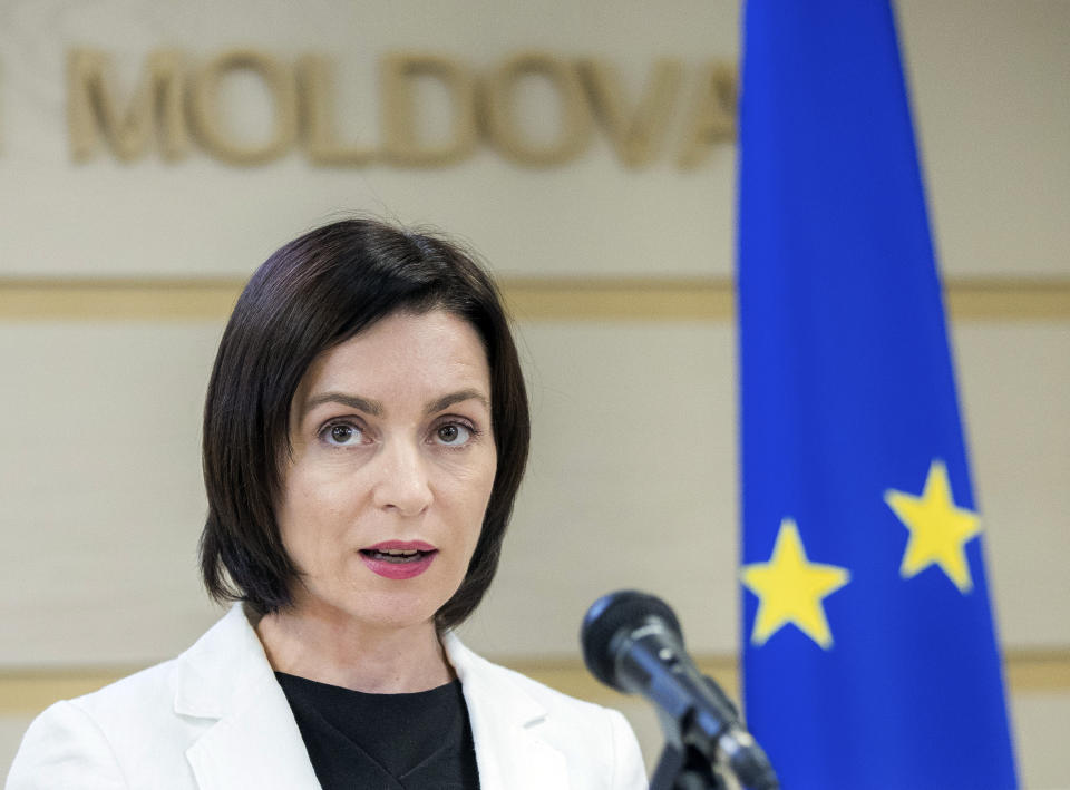 Moldova's Prime Minister Maia Sandu speaks during press statements in Chisinau, Moldova, Thursday, June 13, 2019. Russian President Vladimir Putin On Thursday strongly backed Moldova's new coalition government, which has been locked in a power struggle with a rival group amid a surge in political tensions in the ex-Soviet nation. (AP Photo/Roveliu Buga)