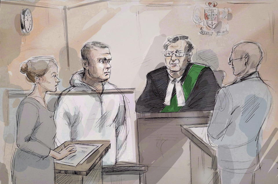File-This April 24, 2018, file photo shows Duty counsel Georgia Koulis, left to right, Alek Minassian, Justice of the Peace Stephen Waisberg, and Crown prosecutor Joe Callaghan in court in Toronto. A newly released video shows Minassian, accused of driving a van into pedestrians in Toronto and killing 10 people, telling police he accomplished his mission and that he’s part of an online group of sexually frustrated men who plot attacks against people who have sex. (Alexandra Newbould/The Canadian Press via AP, File)
