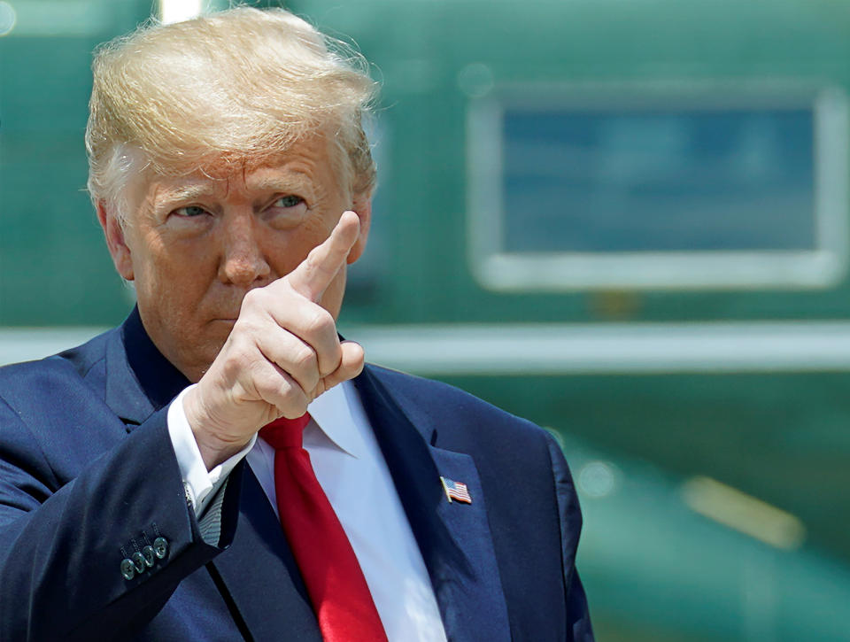 U.S. President Donald Trump walks to board Air Force One as he departs Washington for travel to the G20 summit in Osaka, Japan from Joint Base Andrews, Maryland, U.S., June 26, 2019. REUTERS/Kevin Lamarque