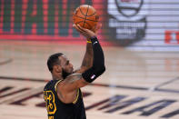 Los Angeles Lakers forward LeBron James shoots against the Miami Heat during the second half in Game 5 of basketball's NBA Finals Friday, Oct. 9, 2020, in Lake Buena Vista, Fla. (AP Photo/Mark J. Terrill)