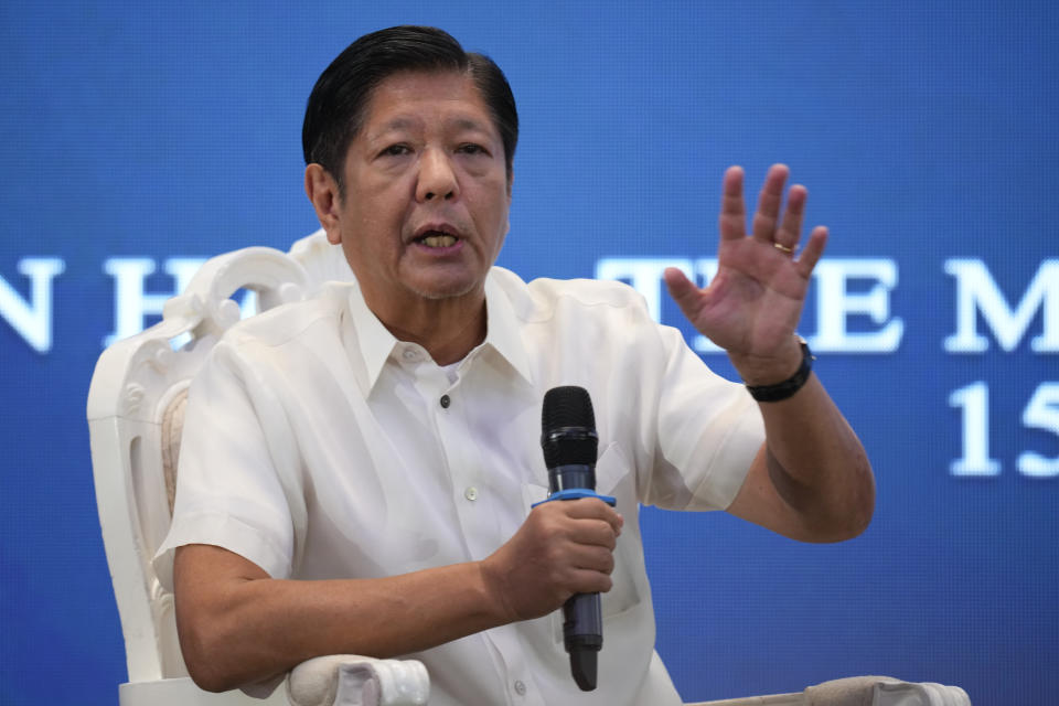 Philippine President Ferdinand Marcos Jr. gestures as he answers questions during a forum of the Foreign Correspondents Association of the Philippines on Monday, April 15, 2024, in Manila, Philippines. (AP Photo/Aaron Favila)