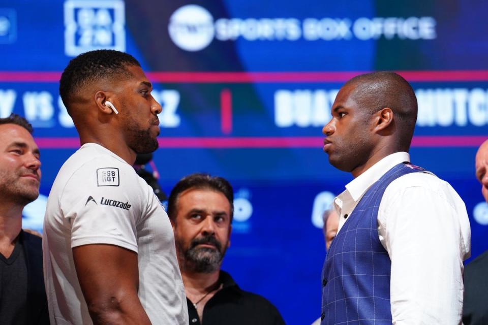 Anthony Joshua (left) and Daniel Dubois face off at a press conference in June (Jordan Pettitt/PA) (PA Wire)