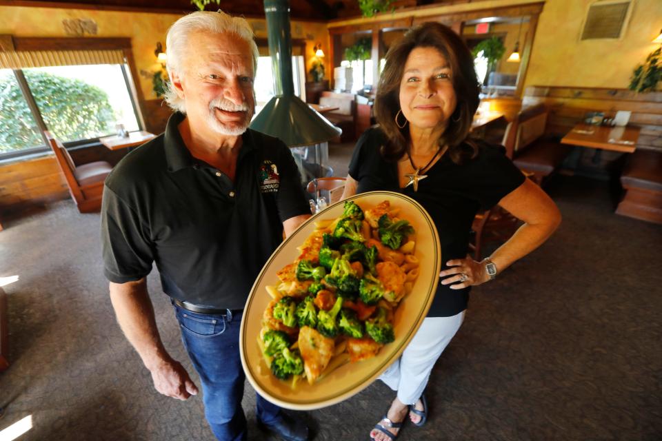 Mike Riccardi and his wife Jean Riccardi offer a chicken broccoli ziti dish at Riccardi's Restaurant on Hathaway Road in New Bedford.