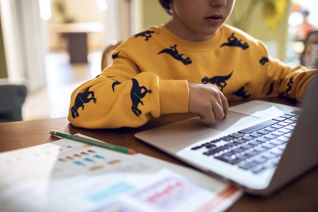 An image of a child doing online learning.