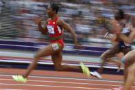 Carmelita Jeter of the U.S. breaks away from the field to win her women's100m heat 2 during the London 2012 Olympic Games at the Olympic Stadium August 3, 2012.