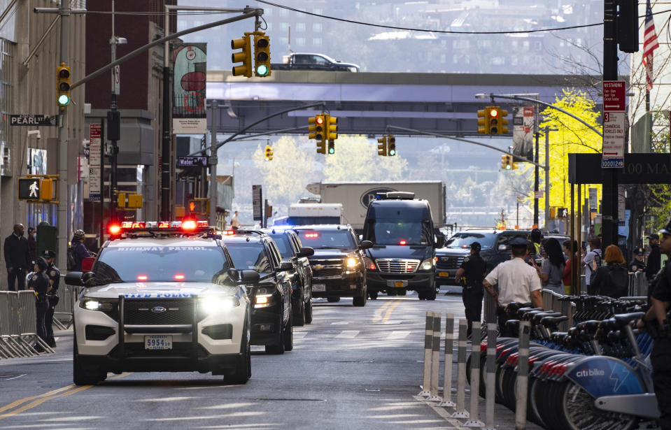 Former President Donald Trump arrives in a motorcade for a deposition in New York Thursday, April 13, 2023. (AP Photo/Craig Ruttle)