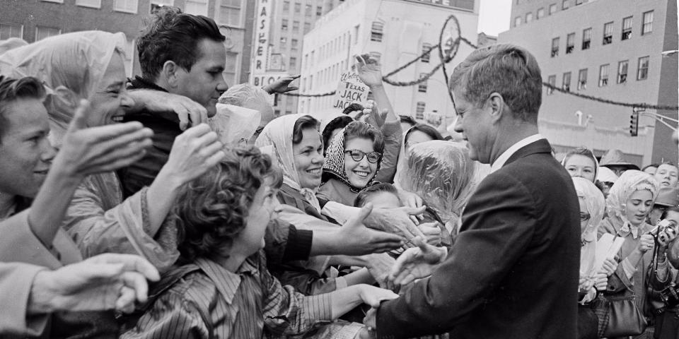 kennedy greeting people