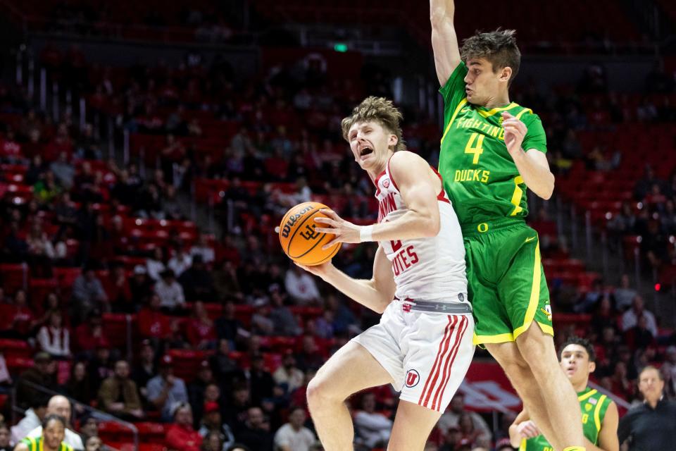 Utah Utes guard Cole Bajema (2) is blocked by Oregon Ducks guard Brennan Rigsby (4) at the Huntsman Center in Salt Lake City on Jan. 21, 2024. | Marielle Scott, Deseret News