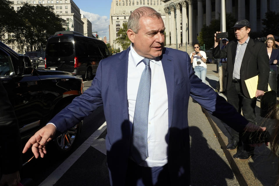 FILE - Lev Parnas leaves federal court in New York, Friday, Oct. 22, 2021. Andrey Muraviev, a Russian tycoon whose name arose prominently in the illegal political contribution case against Parnas and Igor Fruman, was secretly charged with conspiracy in a New York court, prosecutors revealed Monday, March 14, 2022. (AP Photo/Richard Drew, File)