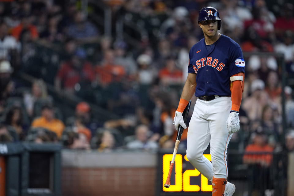 Houston Astros' Jeremy Peña walks back to the dugout after striking out against the Kansas City Royals during the sixth inning of a baseball game Sunday, Sept. 24, 2023, in Houston. (AP Photo/David J. Phillip)