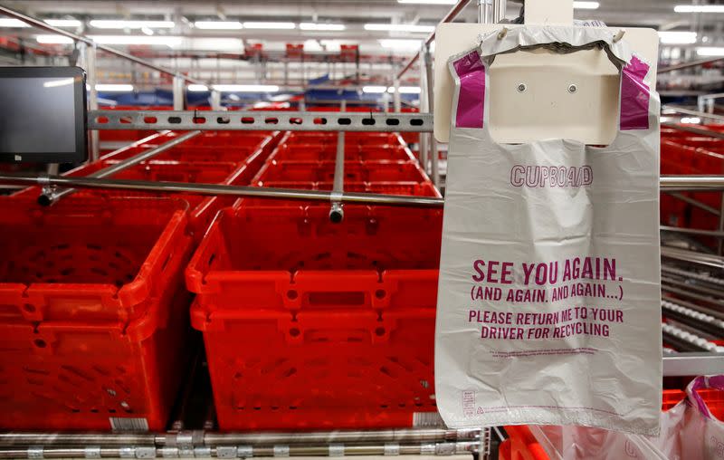 FILE PHOTO: Ocado robots are seen inside a warehouse in Erith