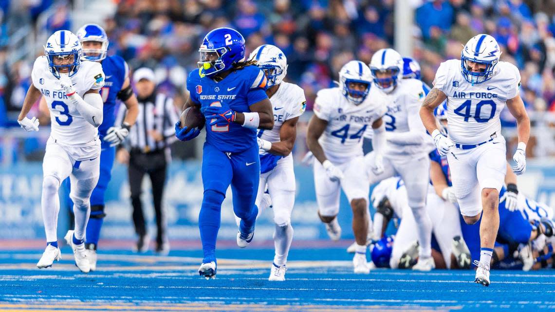 Boise State running back Ashton Jeanty leaves the Air Force defense behind on his way to a 50-yard touchdown run in the Broncos’ 27-19 win over the Falcons on Nov. 24.