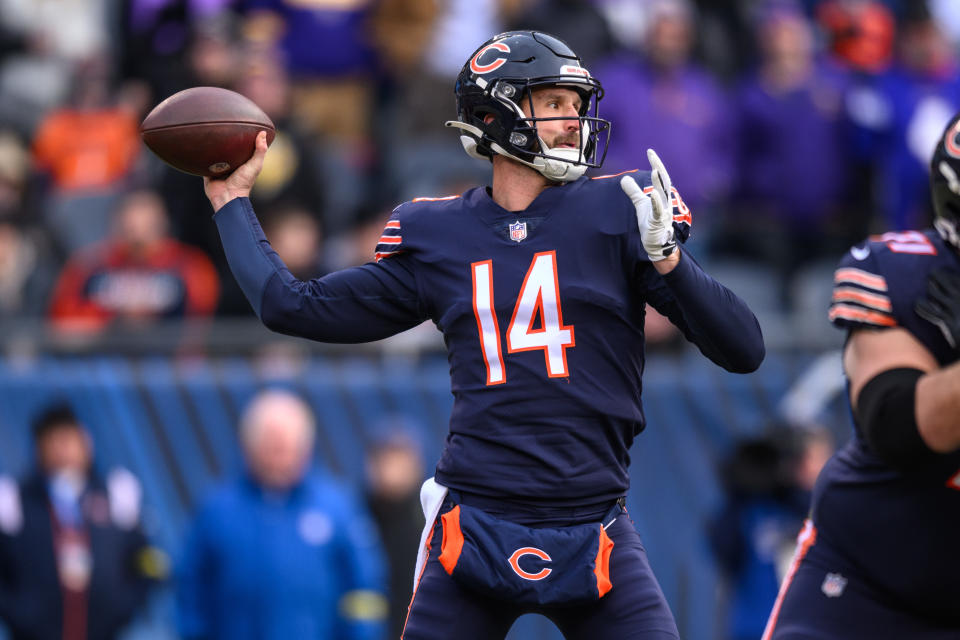 Jan 8, 2023; Chicago, Illinois, USA; Chicago Bears quarterback Nathan Peterman (14) passes the ball during the first quarter against the <a class="link " href="https://sports.yahoo.com/nfl/teams/minnesota/" data-i13n="sec:content-canvas;subsec:anchor_text;elm:context_link" data-ylk="slk:Minnesota Vikings;sec:content-canvas;subsec:anchor_text;elm:context_link;itc:0">Minnesota Vikings</a> at Soldier Field. Mandatory Credit: Daniel Bartel-USA TODAY Sports