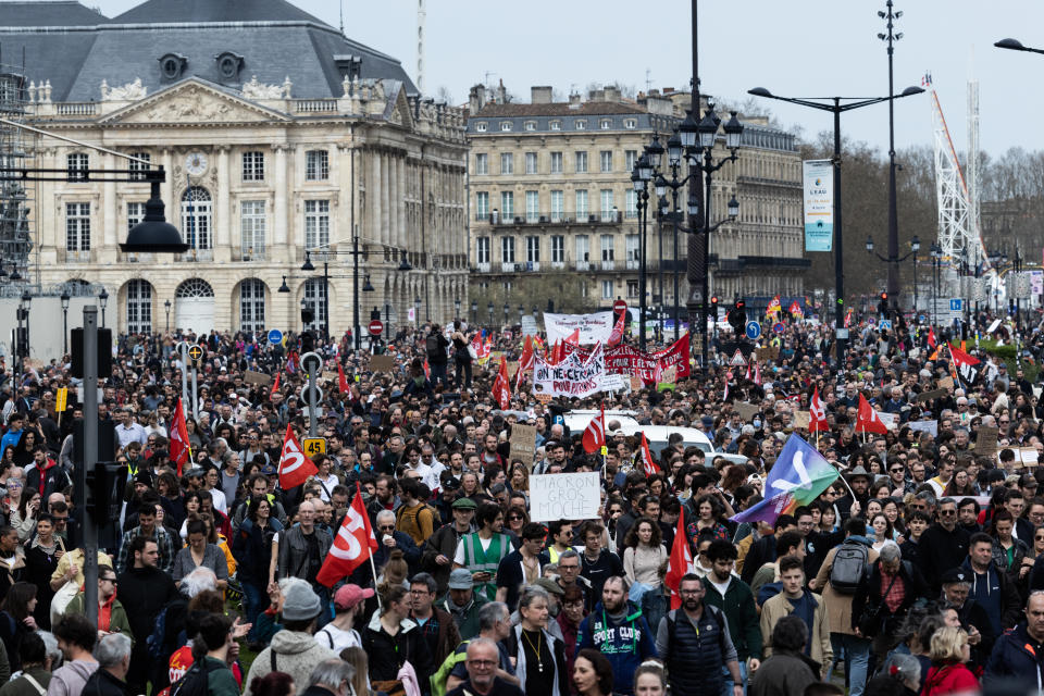 Overview of the protesters during a demonstration on a national action day, a week after the government pushed a pensions reform through parliament without a vote, using the article 49.3 of the constitution, in Bordeaux, southwestern France, on March 23, 2023. French President defiantly vowed to push through a controversial pensions reform on March 22, 2023, saying he was prepared to accept unpopularity in the face of sometimes violent protests. (Photo by Jerome Gilles/NurPhoto via Getty Images)