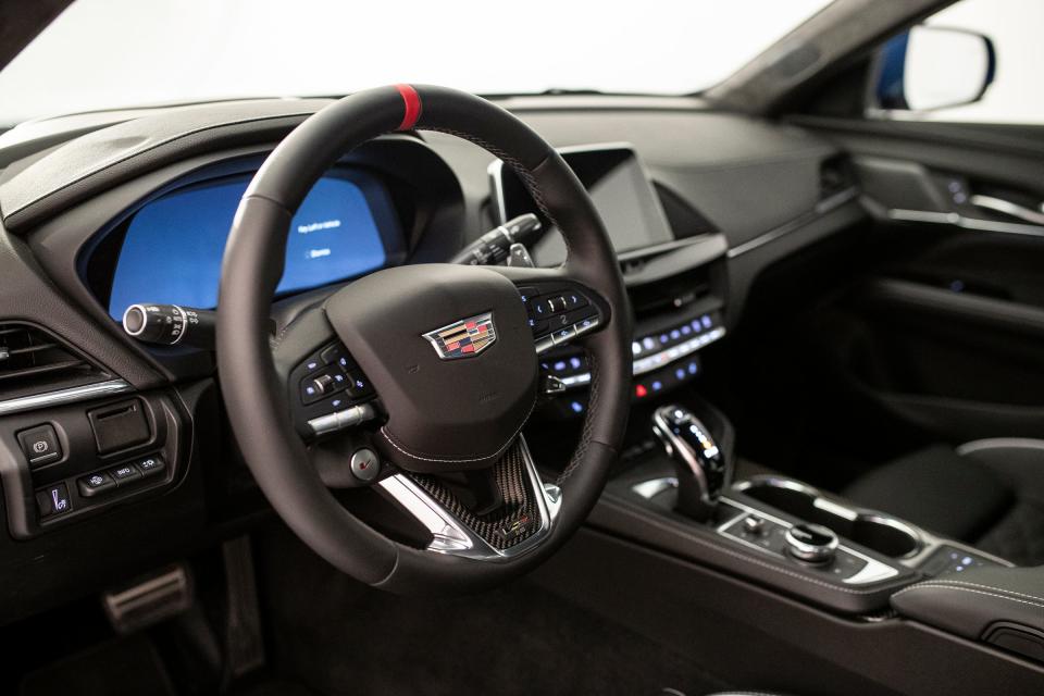 Steering wheel and infotainment system of a 2022 Cadillac CT4-V Blackwing in Warren, Mich. on Jan. 29, 2021. 