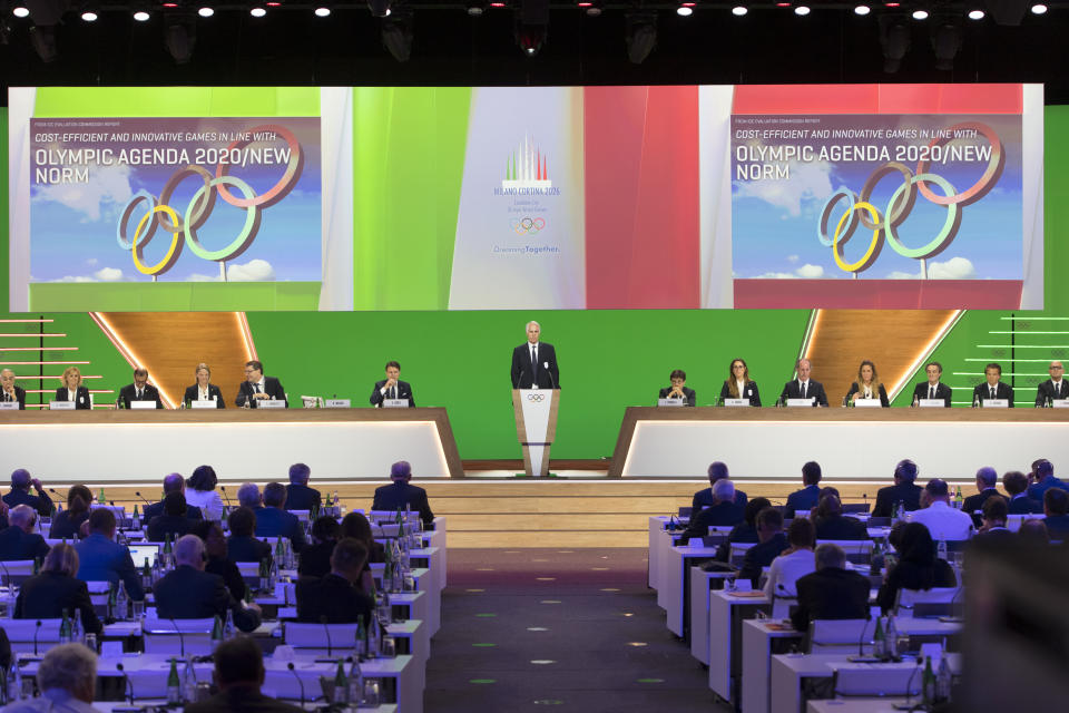 Italy's National Olympic Committee (CONI) president Giovanni Malago speaks during the presentation final presentation of the Milan-Cortina candidate cities the first day of the 134th Session of the International Olympic Committee (IOC), at the SwissTech Convention Centre, in Lausanne, Switzerland, Monday, June 24, 2019. The host city of the 2026 Olympic Winter Games will be decided during the134th IOC Session. Stockholm-Are in Sweden and Milan-Cortina in Italy are the two candidate cities for the Olympic Winter Games 2026. (Laurent Gillieron/Keystone via AP)