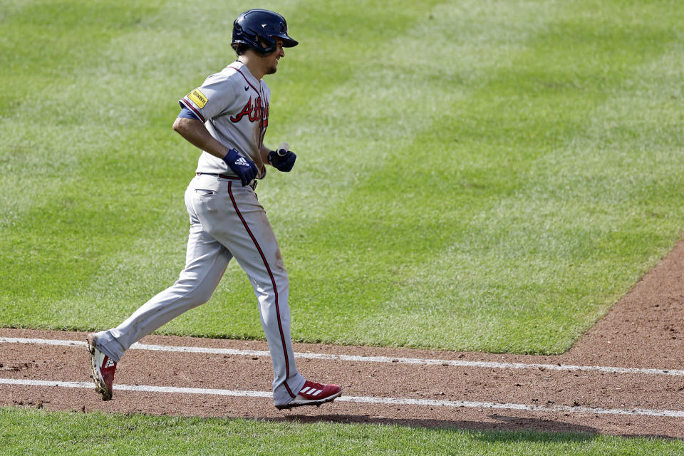 Atlanta Braves' Nicky Lopez rounds the bases after hitting a three-run home run against the New York Mets during the ninth inning in the first baseball game of a doubleheader on Saturday, Aug. 12, 2023, in New York. The Braves won 21-3. (AP Photo/Adam Hunger)