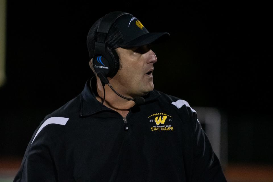 Archbishop Wood head coach Dave Armstrong walks the sidelines during a football game against La Salle at William Tennent High School in Warminster, on Friday, October 14, 2022. The Explorers beat the Vikings 6-3 in overtime.