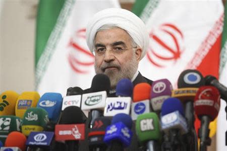 Iranian President-elect Hassan Rohani speaks with the media during a news conference in Tehran June 17, 2013. REUTERS/Fars News/Majid Hagdost