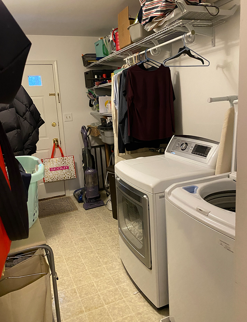 The Laundry Room Before, with white walls and beige floor