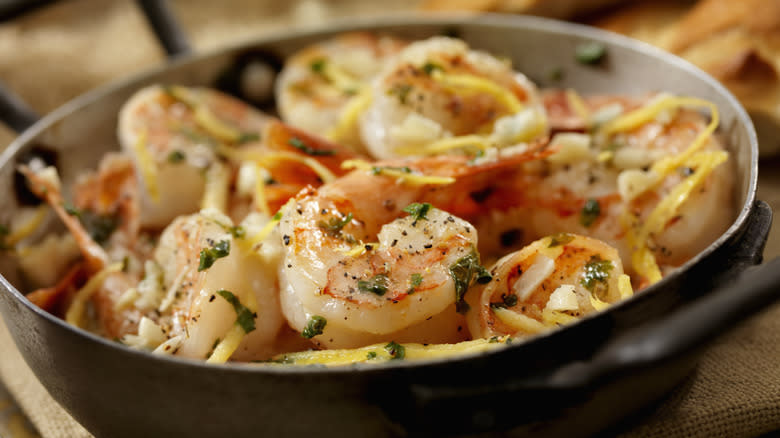Seasoned shrimp in sautee pan
