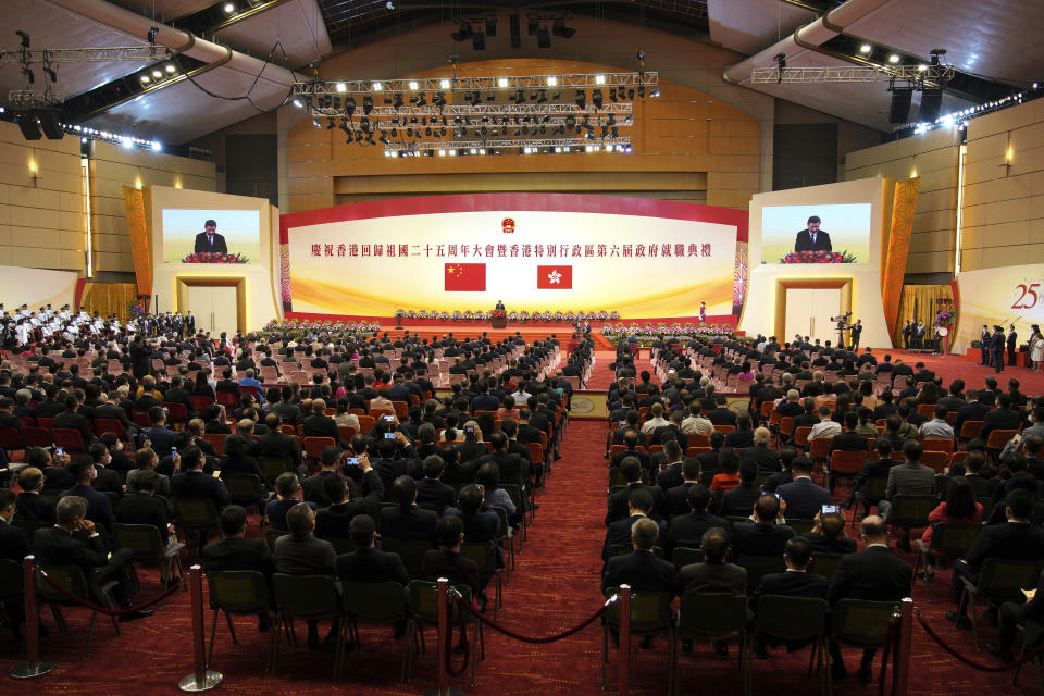 China's President Xi Jinping, center, gives a speech following a swearing-in ceremony to inaugurate the city's new leader and government in Hong Kong Friday, July 1, 2022, on the 25th anniversary of the city's handover from Britain to China. (Selim Chtayti/Pool Photo via AP)