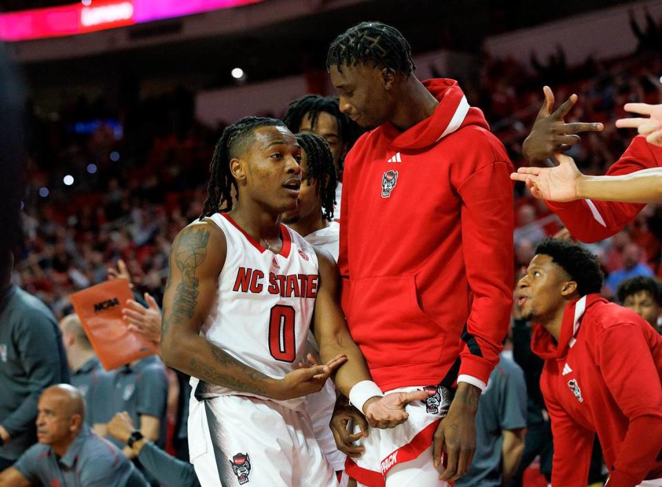 N.C. State’s DJ Horne reacts after making a three-point basket late in the Wolfpack’s 82-70 win over Saint Louis on Wednesday, Dec. 20, 2023, at PNC Arena in Raleigh, N.C.