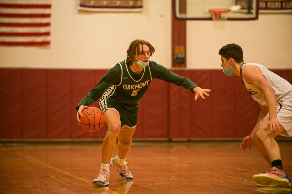 Oakmont's Jaylen Kirkland looks to beat a Shepherd Hill defender.