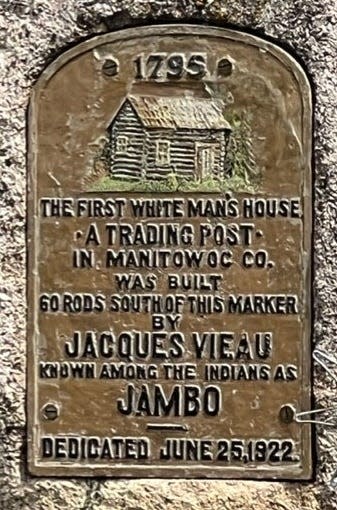 Bronze tablet on the granite boulder as seen today.