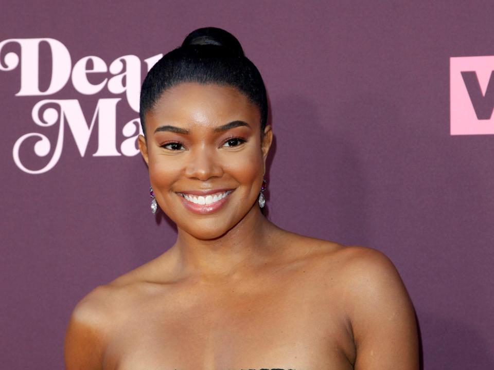 Gabrielle Union smiles on the red carpet.