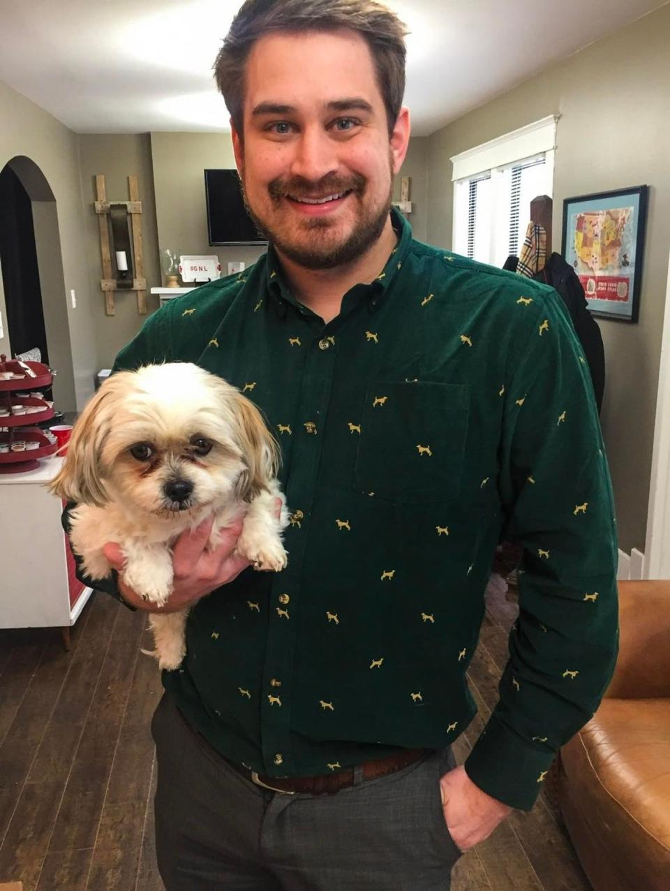 Tim Shrum, with Maltese Shih Tzu Tryp, says he feels bereft after the adored pet was caught up in his divorce (Courtesy of Tim Shrum)