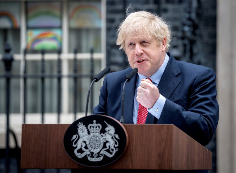Britain's PM Johnson returns to 10 Downing Street