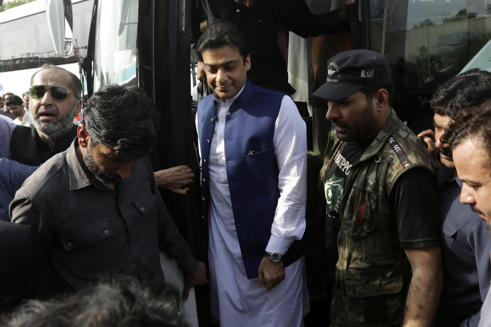 Hamza Sharif, center, sitting chief minister of Pakistan's Punjab province, arrives to vote in provincial assembly, in Lahore, Pakistan, Friday, July 22, 2022. Former Pakistani Prime Minister Imran Khan's party was sidelined in a key vote Friday in the local assembly in Punjab province, despite winning a byelection there earlier this week. Khan slammed the development and called on his supporters to rally across Pakistan. (AP Photo/K.M. Chaudary)