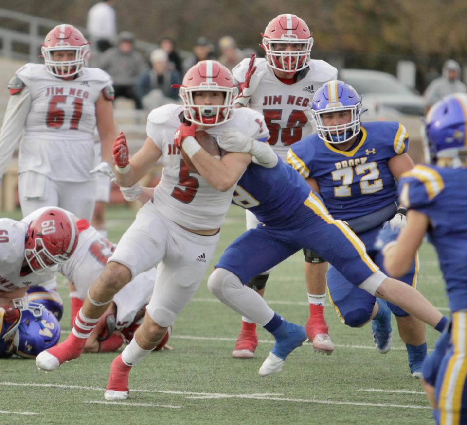 Jim Ned running back Xavier Wishert breaks a tackle against Brock.