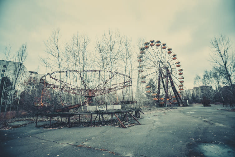 <span class="caption">Chernobyl devastation.</span> <span class="attribution"><a class="link " href="https://www.shutterstock.com/image-photo/abandoned-carousel-ferris-amusement-park-center-407332825?src=E5mDXciM7bQvu05ej5EJEg-1-0" rel="nofollow noopener" target="_blank" data-ylk="slk:Kateryna Upit/shutterstock;elm:context_link;itc:0;sec:content-canvas">Kateryna Upit/shutterstock</a></span>