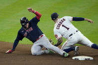 Houston Astros shortstop Carlos Correa tags out Boston Red Sox's Alex Verdugo at second to end the top of the seventh inning in Game 6 of baseball's American League Championship Series Friday, Oct. 22, 2021, in Houston. (AP Photo/Sue Ogrocki)