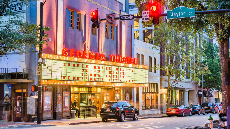 Athens, Georgia, USA - August 3, 2017: People visit the historic Georgia Theatre at dusk.